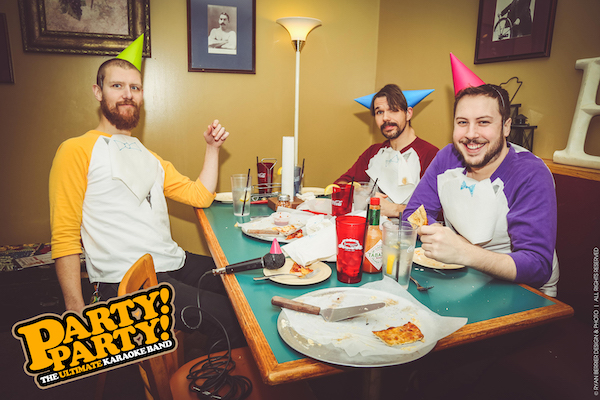 The guys in the band having a pizza party